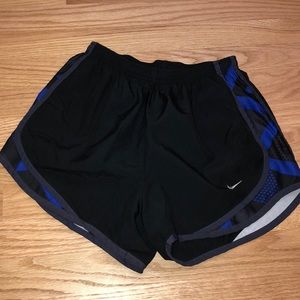 NIKE running shorts in black with blue sides